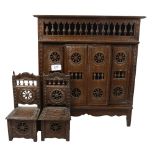 An Antique Continental Folk Art table-top cabinet, with 2 sliding doors and allover turned