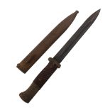 A German military bayonet and scabbard, numbered 7045a and 44CQH, blade length 26cm, overall