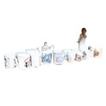 A Lladro angel, and NAO girl in a nightgown, a collection of Royal commemorative jugs, tallest