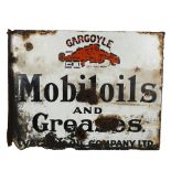 A gargoyle, Mobiloils And Greases flanged double-sided enamel sign, by The Vacuum Oil Company Ltd,