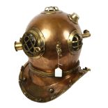 A replica copper and brass Navy diving helmet, mark V MOD-1, on plaque on front serial no. 5123 date