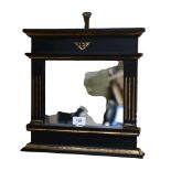 An ebonised and gilded Regency style wall mirror, width 35cm
