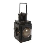 A Vintage BR railway lantern, with bullseye glass, complete with burner and slot-in red shade,