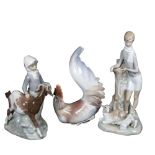 Lladro boy with sheep and lamb, Lladro girl with goat (A/F), Lladro cockerel, tallest 28cm