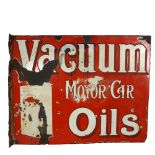 A Vacuum Motorcar Oils double-sided flanged enamel sign, with oil can decoration, 52 x 40cm There