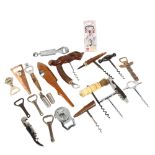 A collection of Vintage and other corkscrews and bottle openers, including bone-handled, fish