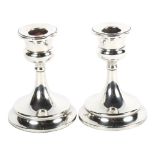 A pair of early 20th century silver candlesticks, hallmarks for Birmingham 1924, height 11cm