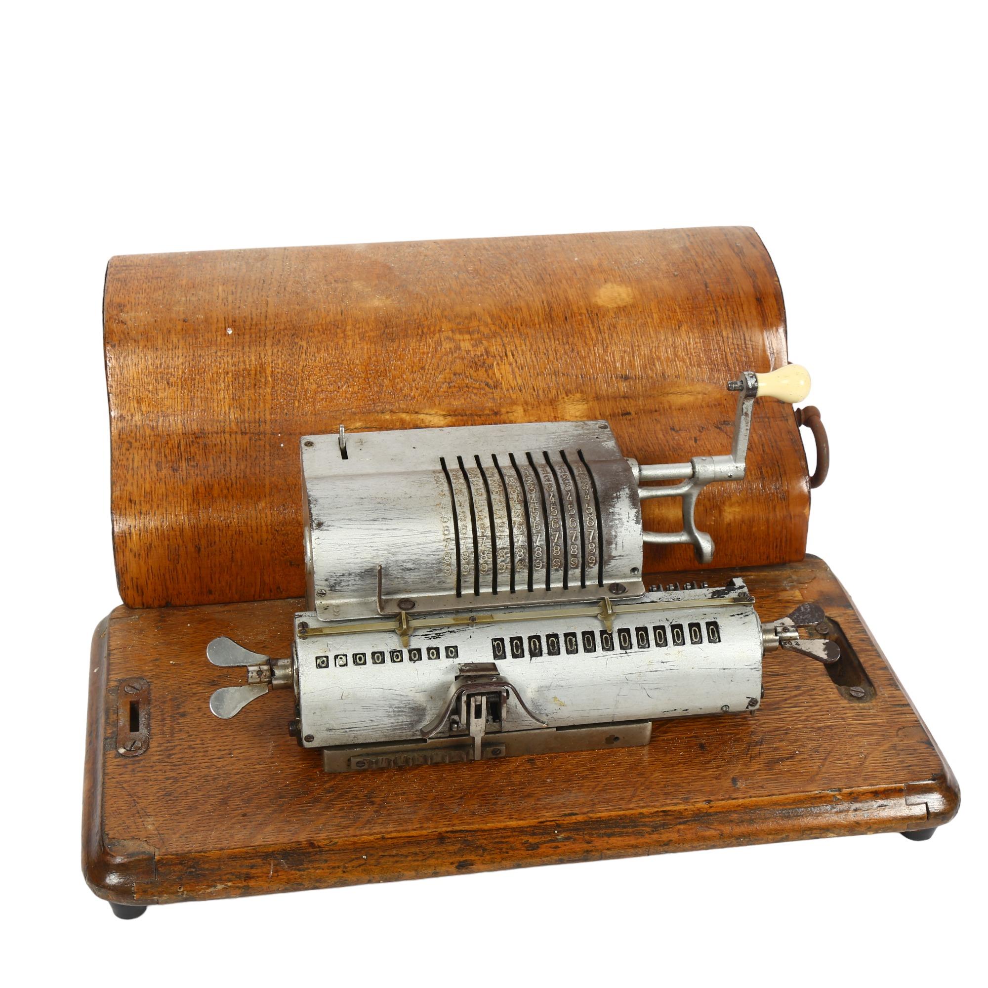 A mid-century mechanical calculator, in original case, length including case 33cm, width 16cm,