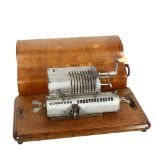 A mid-century mechanical calculator, in original case, length including case 33cm, width 16cm,
