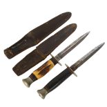 2 Second World War period daggers in sheaths, both with makers marks William Rodgers, Sheffield,