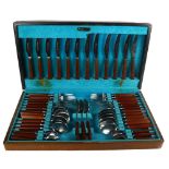 WEBBER & HILL - a canteen of mid-century stainless steel cutlery with teak handles, for 6 people, in