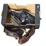 A pair of Vintage football boots, and a pair of Vintage skates