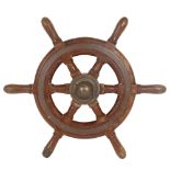A 1930s 6-spoke teak and brass-bound ship's wheel, width 47cm