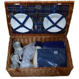 An Optima wicker hamper and contents