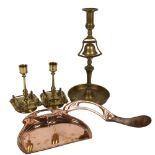 An Art Nouveau copper crumb tray and brush, pair of Antique brass candlesticks, 15cm, and another