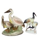 An Austrian pottery figurine depicting a pair of pelicans, and a Hungarian pottery figurine