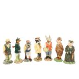 A boxed set of 7 Beswick animals - including lady and gentleman pig, height 14.5cm, fisherman otter,
