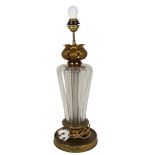 A Vintage brass table lamp, with shaped moulded glass ribbed body and acanthus leaf collar, height