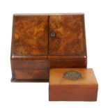 A Victorian burr-walnut stationery box, with inkwell, and a leather storage box with British