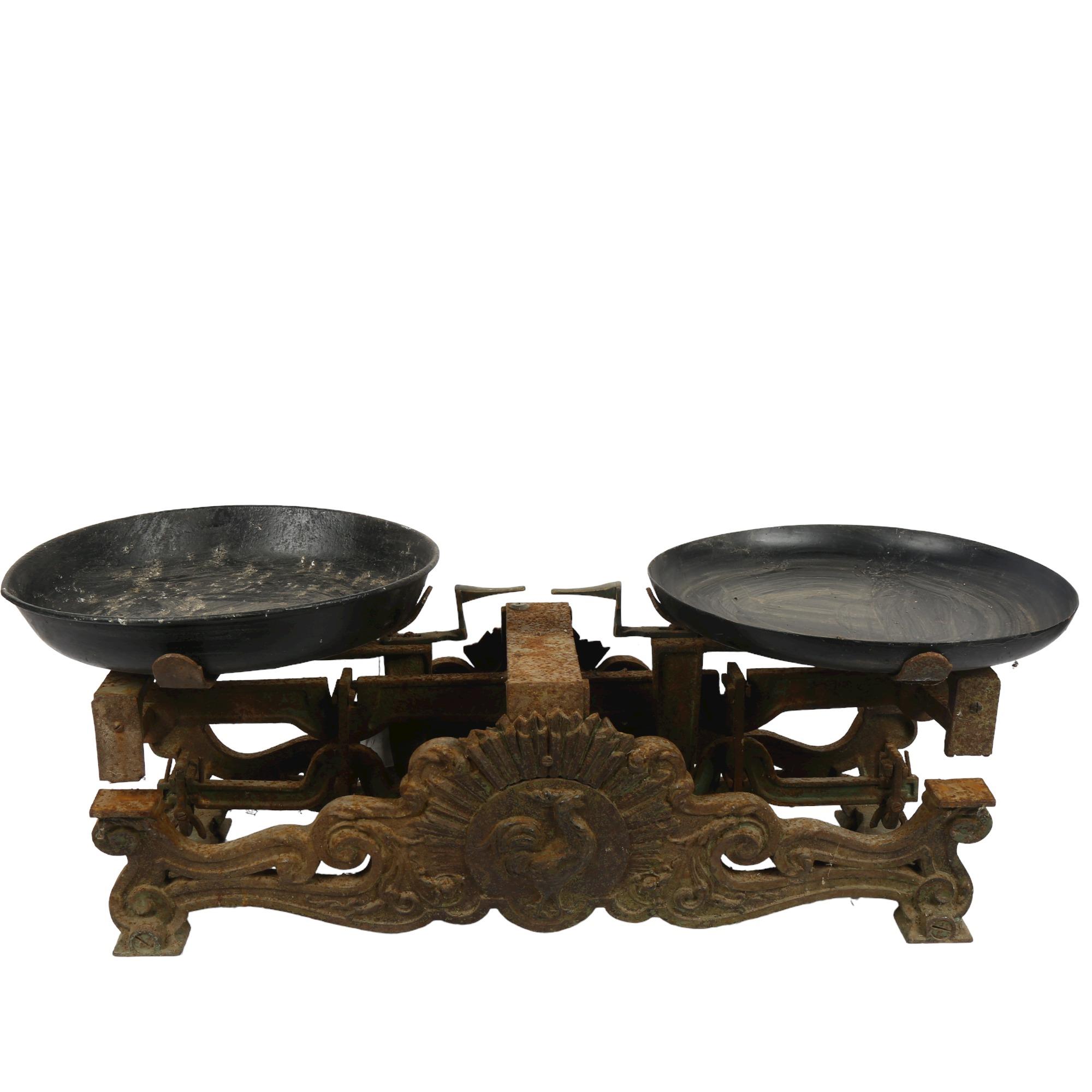 An Antique set of cast-iron balance scales, with relief cockerel motif, width 62cm