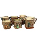 A set of 6 Royal Doulton Dicken's ware jugs, and similar Doulton mug with Oliver Twist decoration,