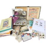 A large quantity of world stamps, stamp reference books, loose stamps etc