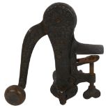 A late Victorian cast-iron "Original safety bar-mounted mechanical corkscrew" reg no. 543083, height
