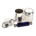 A silver christening mug, a silver Capstan inkwell, a Bristol blue double-ended scent bottle with