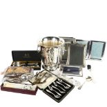 A group of silver plated ware, to include a large Champagne bucket, photo frames, cutlery etc (