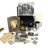 A selection of military ephemera, including a Japanese antimony style floral picture frame,