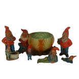 A group of Vintage moulded and painted terracotta gnomes, tallest 12.5cm