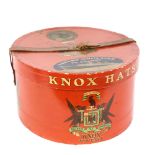An original 20th century Knox Hats red lacquered hat box, with Cunard White Star label and