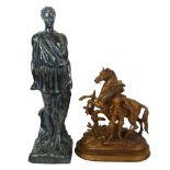 A gilded spelter King Charles Cavalier figure on a plinth, and a composite Grecian or Roman