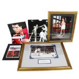 A framed signed photograph of Sir Henry Cooper, a photographic print "the champ is down" when