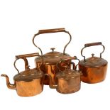 A graduated set of 4 Victorian brass and copper kettles, tallest 34cm