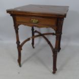 A reproduction mahogany envelope card table, with single frieze drawer and cross stretcher, 59