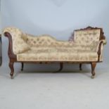 An Edwardian carved and upholstered bow-end chaise longue, 170 x 95 x 65cm Fair overall condition.
