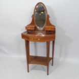 A contemporary mahogany and satinwood-strung jewellery display cabinet, with raised mirrored back