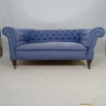 An Antique button-back upholstered Chesterfield style sofa, with single drop-end, 175 x 75 x 90cm