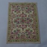 A Kashmiri hand stitched mat, 85 x 61cm