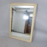 A mid-century rectangular cushion-framed wall mirror, 81 x 117cm