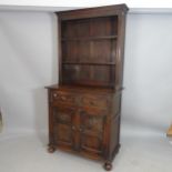 A 1920s stained oak 2-section dresser, with 2 fitted drawers and cupboards under, 91 x 183 x 47cm