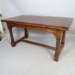 An Antique oak plank-top draw leaf dining table, with turned legs and H-shaped stretcher, 160cm