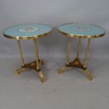 A pair of Hollywood Regency style mid-century circular-top occasional tables, having 3 legs with