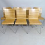 A set of 7 Pedrali Kuadra stackable chairs