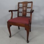 Wylie & Lochhead, a 1930s Art Deco desk armchair, in walnut, with shaped back and leather seat, with