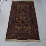 A brown ground Bokora rug, 208 x 124cm