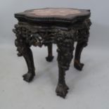 A Chinese rosewood marble-top jardiniere stand, with carved decoration, 39 x 47 x 39cm