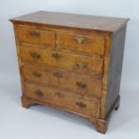 A 19th century crossbanded Walnut chest of 2 short and 3 long drawers, on bracket feet, 111cm x