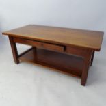 A contemporary mahogany 2-tier coffee table, with single fitted drawer, by John Lewis, with label,